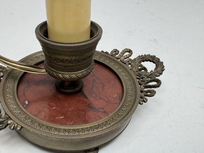 Small candlestick made of chiseled bronze...