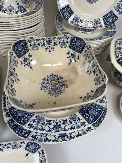 GIEN.
A large set of blue-and-white earthenware...