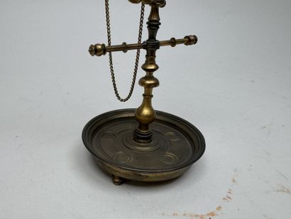 Small brass ring holder with a stylish eagle...