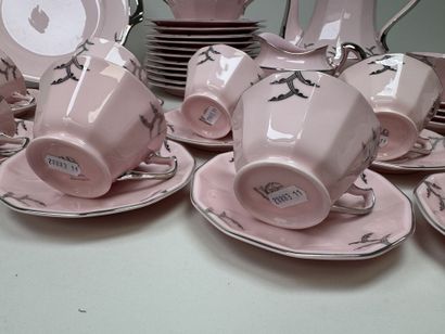 Ceramic dessert serving set on a pink background...