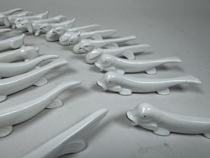 Set of 22 white porcelain knife holders with...