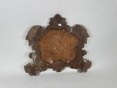 A repoussé brass panel decorated with acanthus...