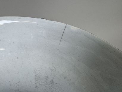 Large polychrome ceramic planter with a foliage...