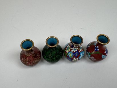ASIA, 20th century.
Four small baluster vases...