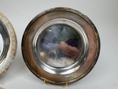 Silver plated metal set including:
- two...