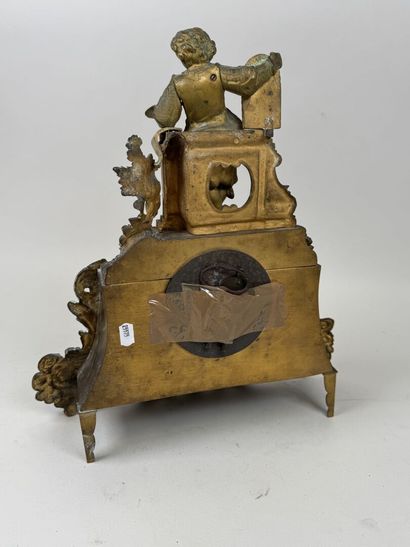A pendulum clock with a golden patina, depicting...