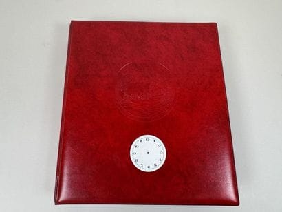 A collection of 75 enameled pocket watch...