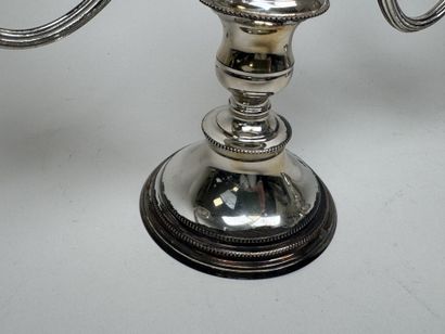 Pair of silver plated candlesticks with three...