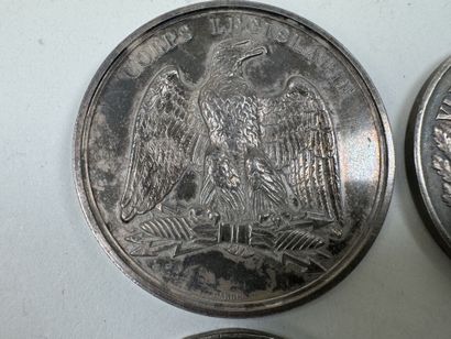 4 médailles en argent et argent doré à décor...