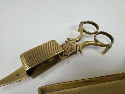 Two bronze or brass candlesticks, one decorated...
