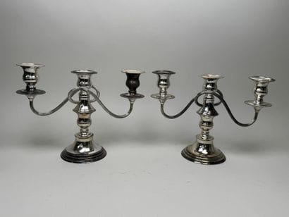 Pair of silver plated candlesticks with three...