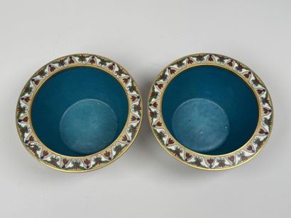 ASIA, 20th century.
Pair of cloisonné brass...