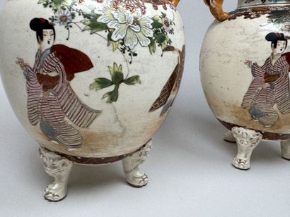 JAPAN, SATSUMA.
Pair of lidded pots in polychrome...