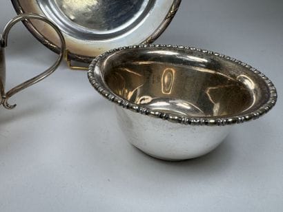 Silver plated metal set including:
- two...