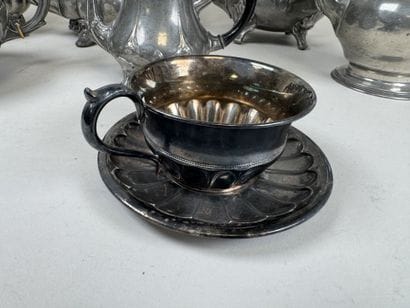 6 pewter shaped pieces including pourers.
H....
