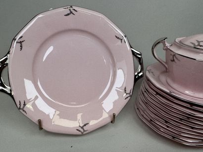 Ceramic dessert serving set on a pink background...