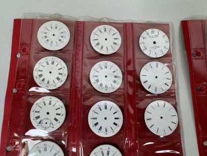 A collection of 75 enameled pocket watch...