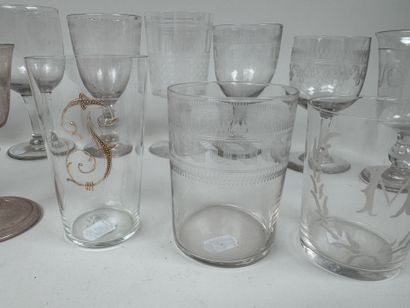 A collection of 15 stemmed glasses or tumblers...