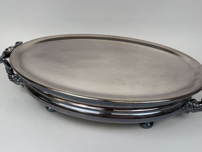 Large, oval-shaped double food warmer made...