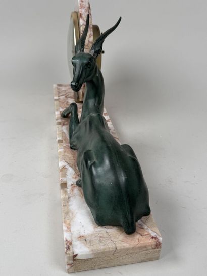 School, 20th century.
Antelope.
Marble clock...