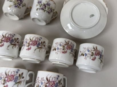 A set of polychrome and gold porcelain consisting...