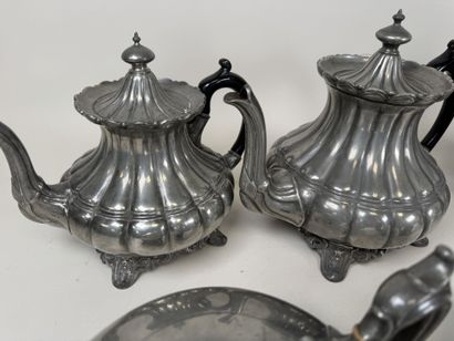 6 pewter shaped pieces including pourers.
H....