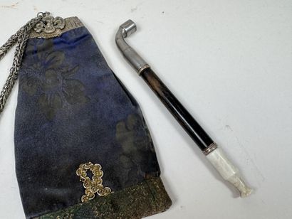 ASIA, 20th century.
- Probably a smoker’s...