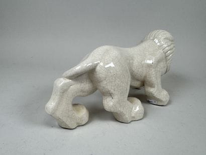 Crackled ceramic figurine decorated with...