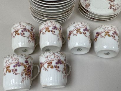 A set of polychrome and gold porcelain consisting...