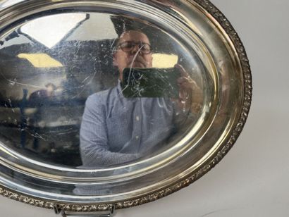 Two oval-shaped silver plated serving platters...