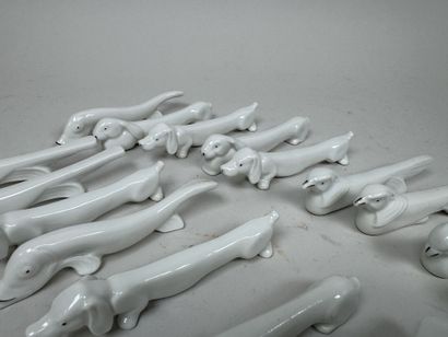 Set of 22 white porcelain knife holders with...
