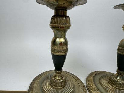 Pair of gilded bronze candlesticks with green...