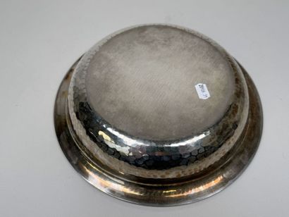 A circular, deep dish made of silver plated...