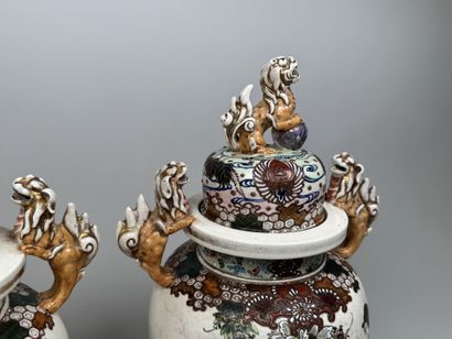 JAPAN, SATSUMA.
Pair of lidded pots in polychrome...