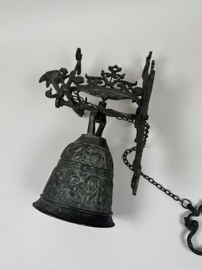 Bell and stand made of patinated bronze,...