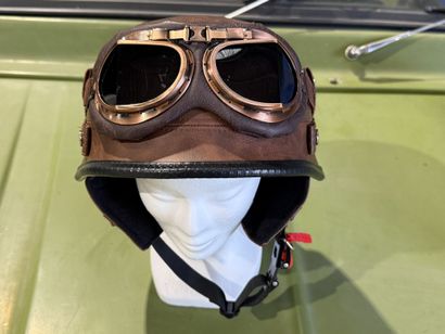 Fancy faux leather helmet with goggles.
Size...