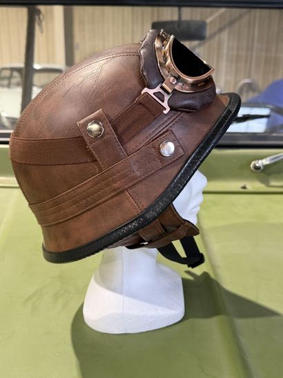 Fancy faux leather helmet with goggles.
Size...