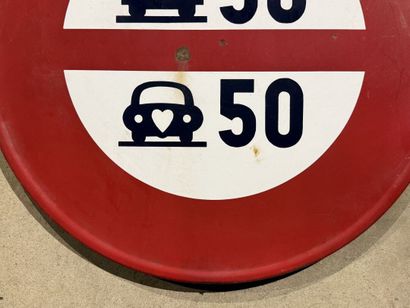Round traffic sign made of polychrome enameled...