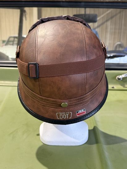 Fancy faux leather helmet with goggles.
Size...