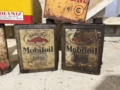 Set of 8 lithographed tin engine oil cans,...
