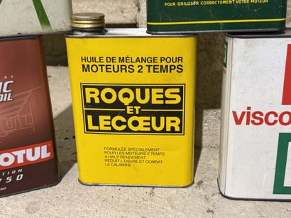 Set of 7 oil cans made of polychrome lithographed...