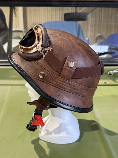 Fancy faux leather helmet with goggles.
Size...