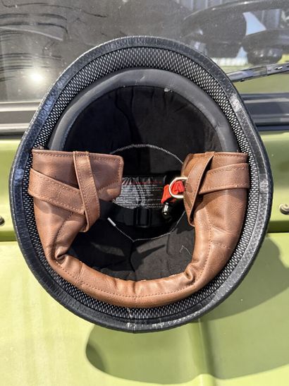 Fancy faux leather helmet with goggles.
Size...