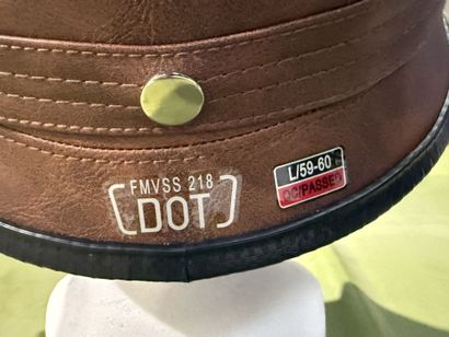 Fancy faux leather helmet with goggles.
Size...