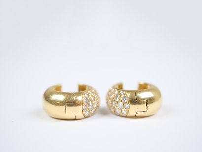A pair of large hinged hoop earrings in 18K...