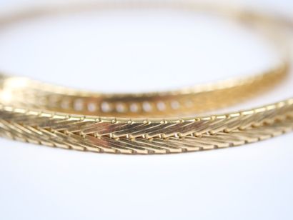 A striking 18K yellow gold (750‰) necklace...