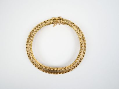 18K yellow gold (750‰) link bracelet decorated...