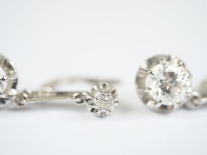 Pair of 18K white gold (750‰) earrings, each...
