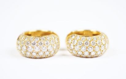 A pair of large hinged hoop earrings in 18K...
