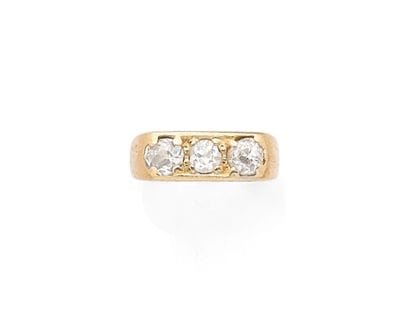 18K yellow gold (750‰) garter ring adorned...